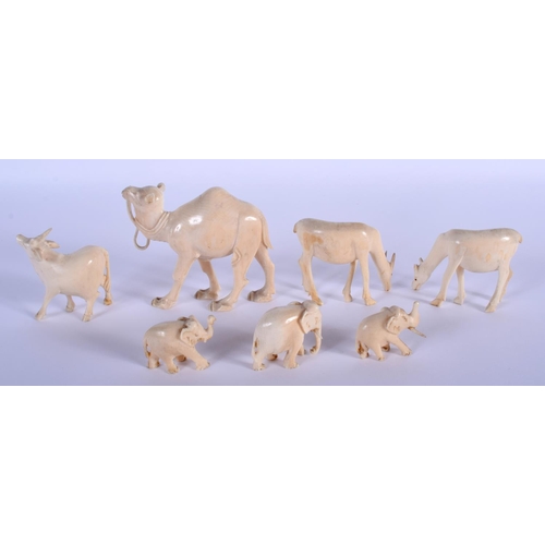 851 - SEVEN EARLY 20TH CENTURY CONTINENTAL CARVED IVORY ANIMALS. Largest 9 cm x 7 cm. (7)