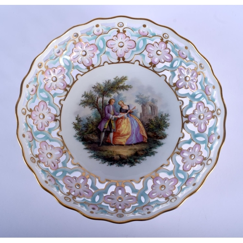 86 - A LARGE 19TH CENTURY MEISSEN PORCELAIN RETICULATED PORCELAIN BOWL painted with lovers within a lands... 