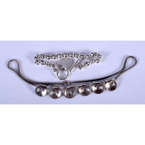 878 - TWO SILVER BRACELETS. 60 grams. Largest 39 cm long. (2)