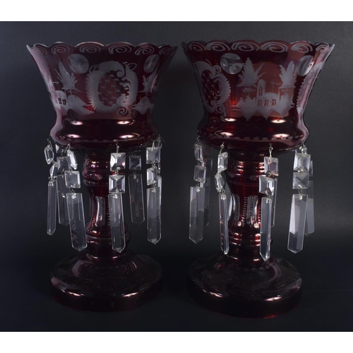 9 - A LARGE PAIR OF VINTAGE RUBY GLASS TABLE LUSTRES decorated with landscapes. 30 cm x 18 cm.