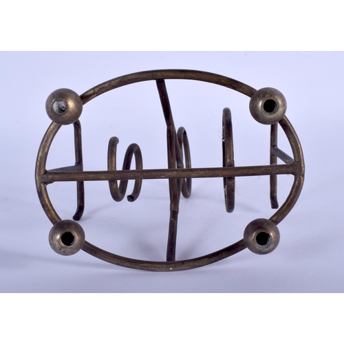 948 - A BRASS TOAST RACK. 14 cm x 14 cm.