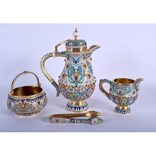 952 - AN UNUSUAL CONTINENTAL SILVER AND ENAMEL JEWELLED COFFEE POT with matching sugar basket, tongs and c... 