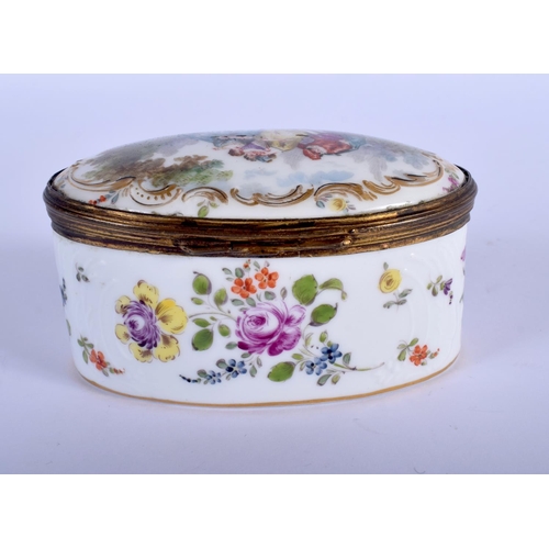 955 - AN ANTIQUE EUROPEAN PORCELAIN PILL BOX AND COVER. 11 cm x 4 cm.