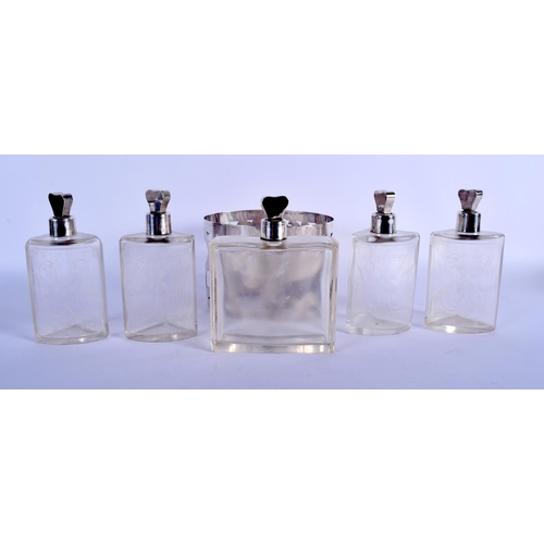 956 - A VINTAGE ENGRAVED GLASS FIVE SECTION SCENT BOTTLE HOLDER. Silver 184 grams. 13.5 cm x 9.5 cm. (5)