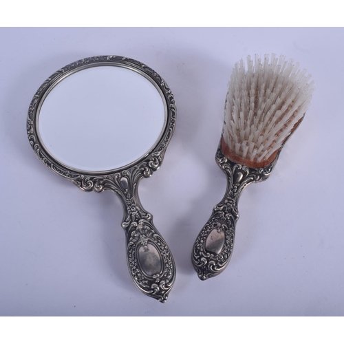 962 - TWO VINTAGE SILVER DRESSING TABLE ITEMS. 447 grams overall. 24 cm x 14 cm.