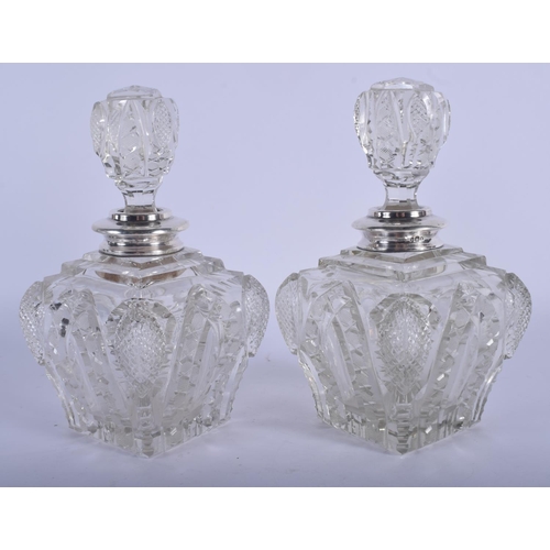 968 - TWO VINTAGE SILVER MOUNTED CUT GLASS SCENT BOTTLES. 17 cm high. (2)