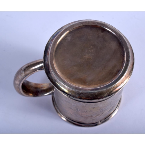 999 - A VINTAGE STERLING SILVER MUG. 94 grams. 10 cm x 8 cm.