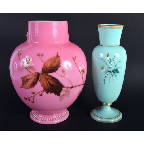 1 - AN EDWARDIAN PINK OPALINE GLASS VASE together with a smaller vase. Largest 21 cm high. (2)