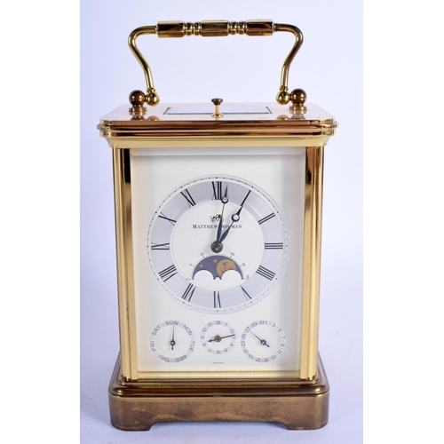 1477 - A BOXED MATTHEW NORMAN MOONPHASE REPEATING CARRIAGE CLOCK with three subsidiary dials. 17.5 cm high ... 