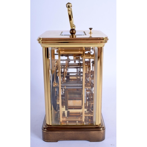 1477 - A BOXED MATTHEW NORMAN MOONPHASE REPEATING CARRIAGE CLOCK with three subsidiary dials. 17.5 cm high ... 