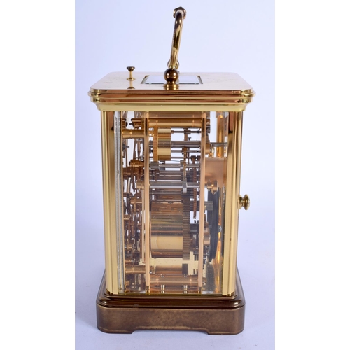 1477 - A BOXED MATTHEW NORMAN MOONPHASE REPEATING CARRIAGE CLOCK with three subsidiary dials. 17.5 cm high ... 