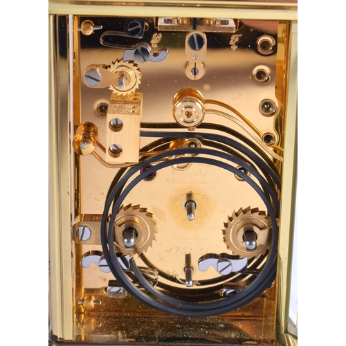 1477 - A BOXED MATTHEW NORMAN MOONPHASE REPEATING CARRIAGE CLOCK with three subsidiary dials. 17.5 cm high ... 