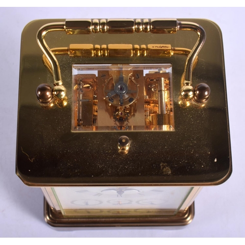 1477 - A BOXED MATTHEW NORMAN MOONPHASE REPEATING CARRIAGE CLOCK with three subsidiary dials. 17.5 cm high ... 