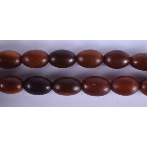 1506 - A FINE 19TH CENTURY CHINESE CARVED RHINOCEROS HORN NECKLACE of gradated form. 71.4 grams. 48 cm long... 