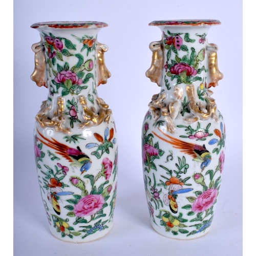 1509 - A PAIR OF LATE 19TH CENTURY CHINESE FAMILLE ROSE CANTON PORCELAIN VASES painted with birds and flowe... 