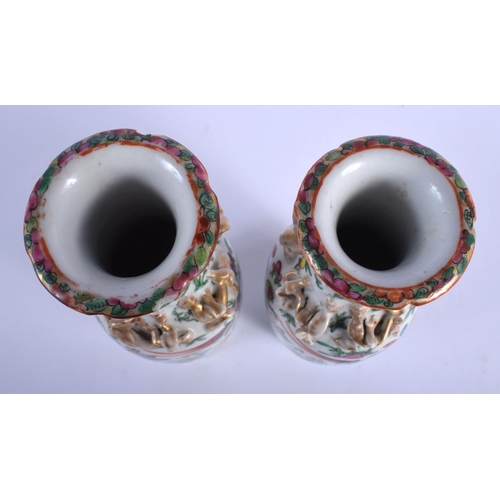 1509 - A PAIR OF LATE 19TH CENTURY CHINESE FAMILLE ROSE CANTON PORCELAIN VASES painted with birds and flowe... 