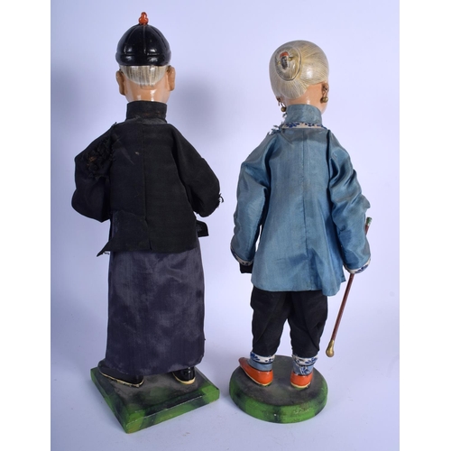 1522 - A RARE PAIR OF EARLY 20TH CENTURY CHINESE POLYCHROMED LACQUER FIGURES Late Qing, modelled upon green... 