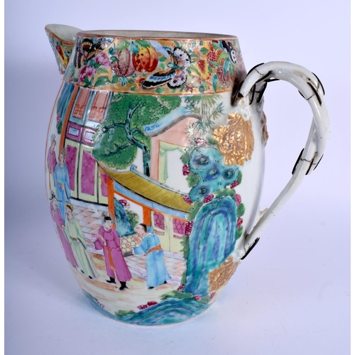 1523 - A LARGE 19TH CENTURY CHINESE CANTON FAMILLE ROSE PORCELAIN CIDER JUG Qing, painted with figures with... 