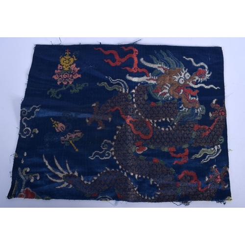 1525 - A 17TH/18TH CENTURY CHINESE BLUE SILK BROCADE EMBROIDERED PANEL Ming/Qing, decorated with dragons. 4... 