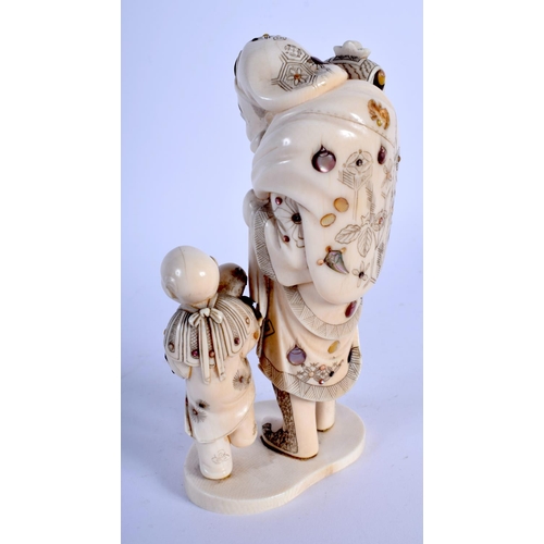 1534 - A 19TH CENTURY JAPANESE MEIJI PERIOD SHIBAYAMA INLAID IVORY FIGURE OF A BUDDHA modelled with a boy c... 