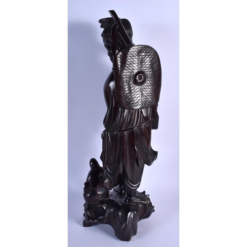 1542 - A VERY LARGE 19TH CENTURY CHINESE CARVED HARDWOOD FIGURE OF A FISHERMAN Qing, modelled holding a fis... 