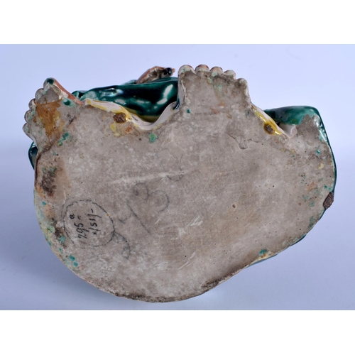 1546 - A LARGE 19TH CENTURY JAPANESE MEIJI PERIOD GREEN GLAZED STONEWARE FIGURE modelled holding a swish. 4... 