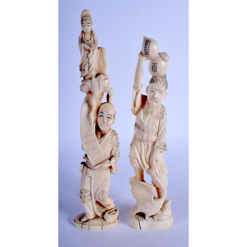 1548 - TWO LATE 19TH CENTURY JAPANESE MEIJI PERIOD CARVED IVORY OKIMONO modelled holding aloft figures and ... 