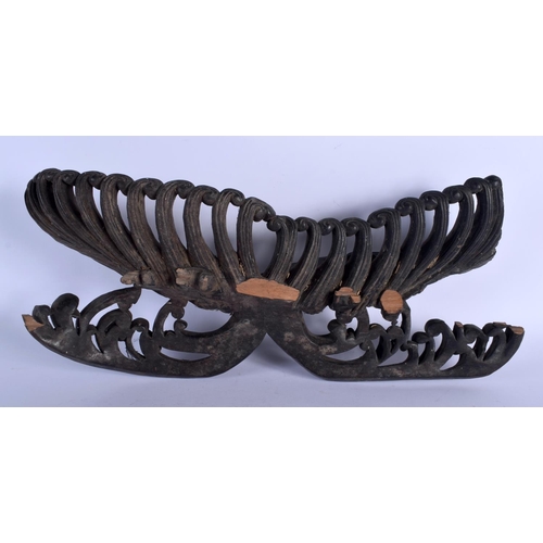 1552 - AN UNUSUAL 19TH CENTURY JAPANESE MEIJI PERIOD CARVED HARDWOOD STAND formed as waves. 38 cm x 15 cm.