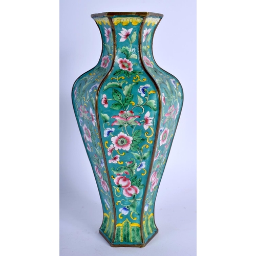 1554 - AN EARLY 20TH CENTURY CHINESE CANTON ENAMEL HEXAGONAL VASE late Qing/Republic, painted with flowers.... 