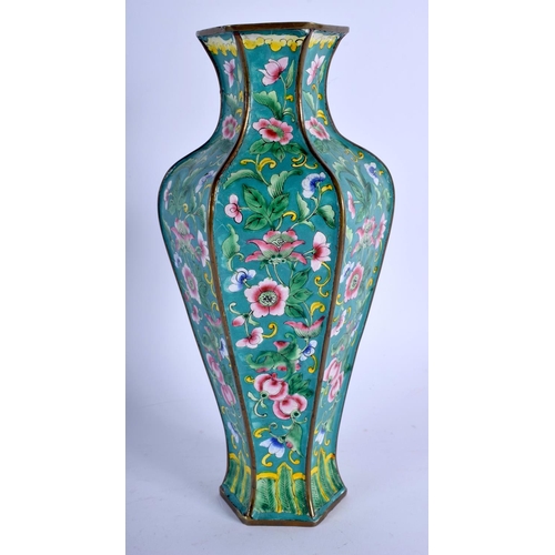 1554 - AN EARLY 20TH CENTURY CHINESE CANTON ENAMEL HEXAGONAL VASE late Qing/Republic, painted with flowers.... 