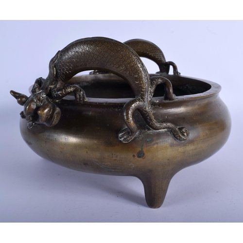 1557 - A RARE 18TH CENTURY CHINESE TWIN HANDLED BRONZE CENSER Qing, bearing elaborate seal mark to base, wi... 