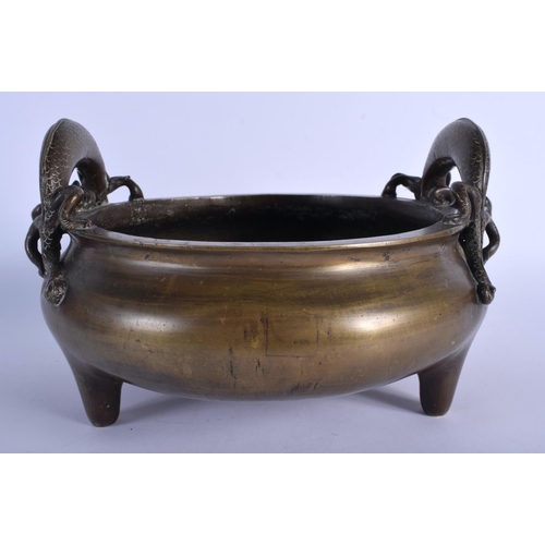 1557 - A RARE 18TH CENTURY CHINESE TWIN HANDLED BRONZE CENSER Qing, bearing elaborate seal mark to base, wi... 