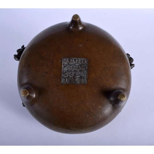 1557 - A RARE 18TH CENTURY CHINESE TWIN HANDLED BRONZE CENSER Qing, bearing elaborate seal mark to base, wi... 