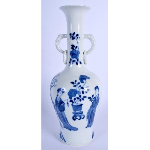 1590 - A CHINESE BLUE AND WHITE PORCELAIN TWIN HANDLED VASE probably 19th century, painted with figures and... 