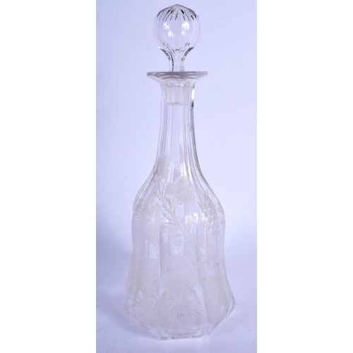 25 - A GEORGE III ENGRAVED GLASS DECANTER AND STOPPER decorated with leaves. 27 cm high.