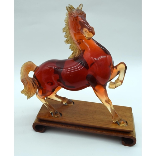 2527 - A  figure of a horse on a stand together with a Character jug of John Barleycorn . 26 x23cm. (2).