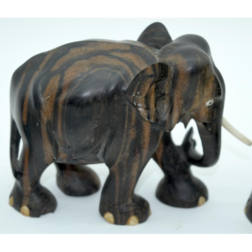 2528 - A Collection of African wooden Elephants and a page turner 13cm (6).
