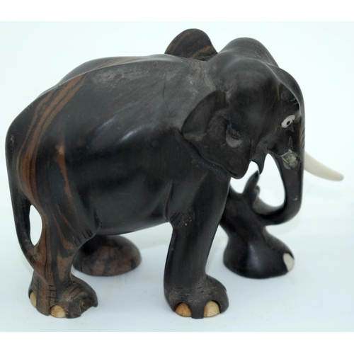 2528 - A Collection of African wooden Elephants and a page turner 13cm (6).