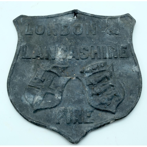 2533 - An antique London and Lancashire Fire Insurance lead plaque together with another lead plaque and  c... 