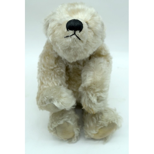 2543 - A collection of vintage soft toys and teddys Deans rag book, etc 34cm (4).