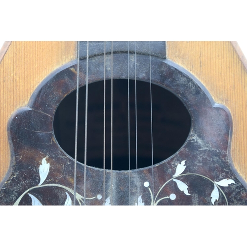 2548 - An antique Gennaro Maglioni mandolin with Mother of Pearl inlay 60cm .