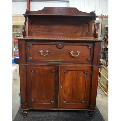 2566 - AN EARLY 19TH CENTURY SECRETAIRE MAHOGANY CHIFFONIER with lyre supports, brass mounts and reeded doo... 
