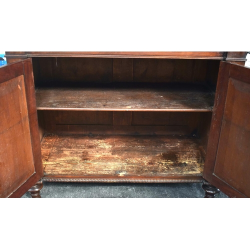 2566 - AN EARLY 19TH CENTURY SECRETAIRE MAHOGANY CHIFFONIER with lyre supports, brass mounts and reeded doo... 