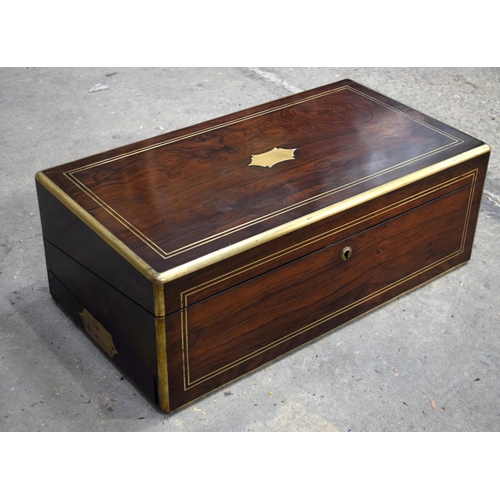 2576 - A FINE AND LARGE ANTIQUE CAMPAIGN TRAVELLING WRITING BOX with material slope and fitted interior. 61... 