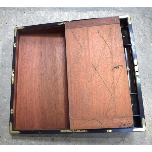 2576 - A FINE AND LARGE ANTIQUE CAMPAIGN TRAVELLING WRITING BOX with material slope and fitted interior. 61... 
