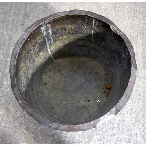 2580 - AN ANTIQUE COPPER RIVETED JARDINIERE upon a stand. 35 cm x 54 cm.