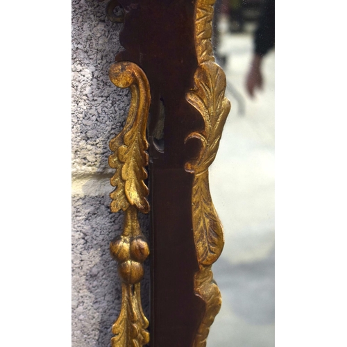 2582 - AN ANTIQUE MIRROR. 111 cm x 63 cm.