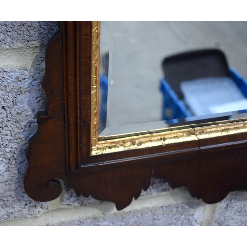 2583 - AN ANTIQUE MIRROR. 94 cm x 55.5 cm.