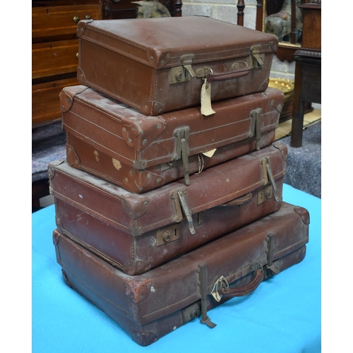 2591 - FOUR VINTAGE LEATHER SUITCASES. 66 cm x 41 cm. (4)
