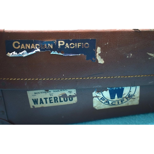 2591 - FOUR VINTAGE LEATHER SUITCASES. 66 cm x 41 cm. (4)